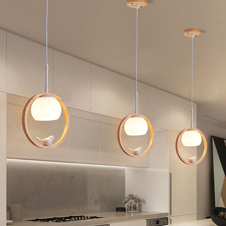 Moderne nordische Pendelleuchte mit Glas, Kautschukholz-Ring und Vogel-Design, 1-flammig, für das Wohnzimmer 