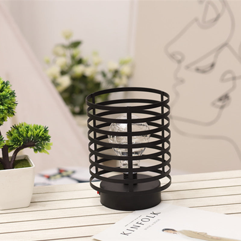 Lámpara de mesa de noche LED de batería de hierro con columna redonda simple y creativa 
