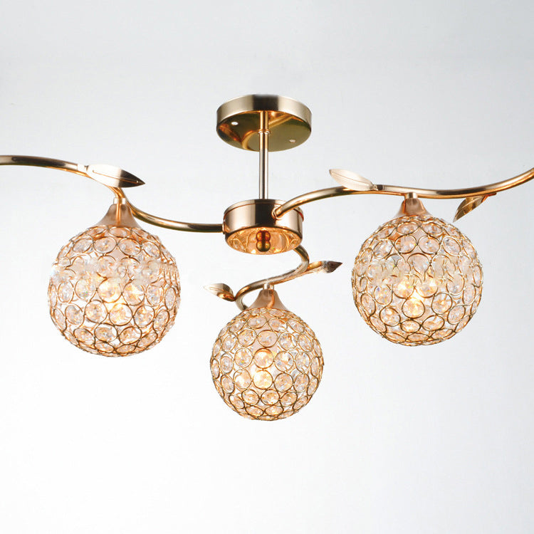 Modern Art Deco Round Hollowed Out Orb Iron Crystal 3-Light Semi-Flush Mount Ceiling Light For Living Room