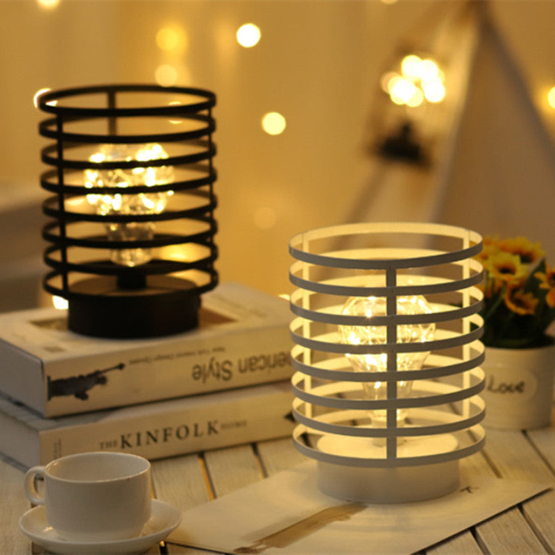 Lámpara de mesa de noche LED de batería de hierro con columna redonda simple y creativa 