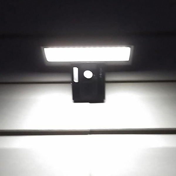 Moderne minimalistische rechteckige Smart-Solar-LED-Wandleuchte für den Außenbereich aus ABS und PC mit Bewegungssensor 