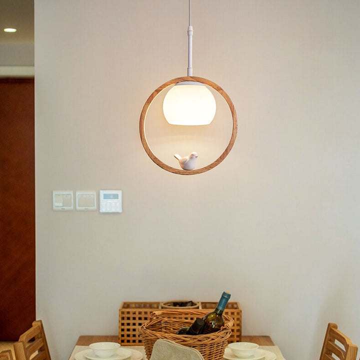 Moderne nordische Pendelleuchte mit Glas, Kautschukholz-Ring und Vogel-Design, 1-flammig, für das Wohnzimmer 