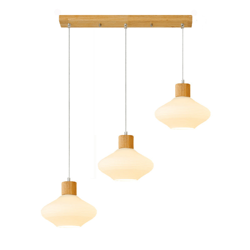 Moderne minimalistische ovale Inselleuchte aus Glas, Gummibaumholz und Metall, 1/3-flammiger Kronleuchter für das Esszimmer 