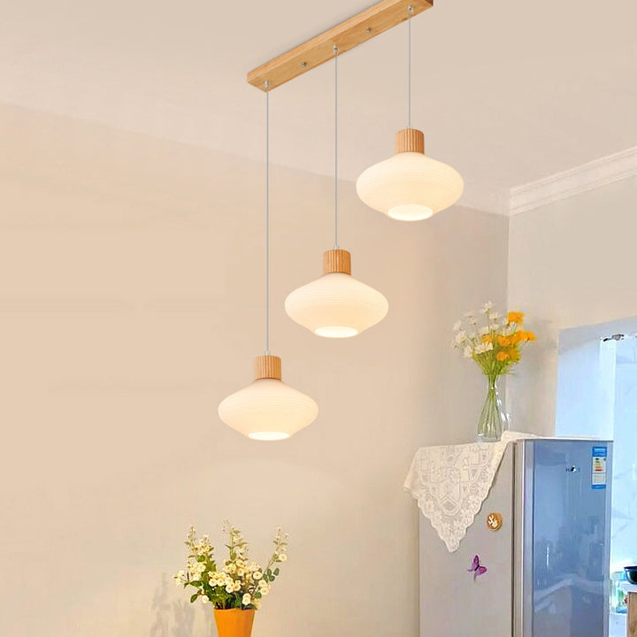Moderne minimalistische ovale Inselleuchte aus Glas, Gummibaumholz und Metall, 1/3-flammiger Kronleuchter für das Esszimmer 