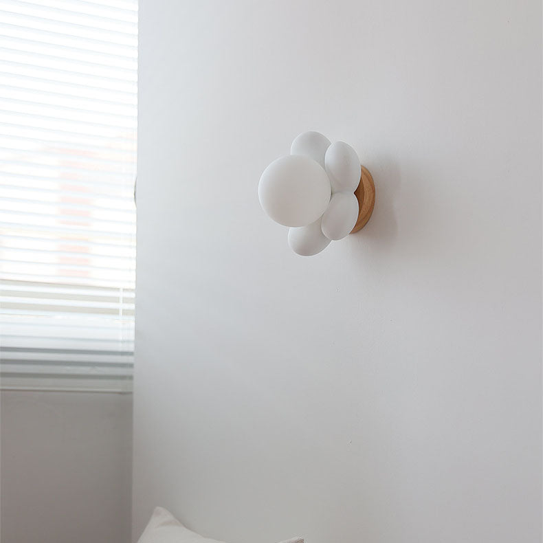 Moderne kreative 1-flammige Kinder-Wandleuchte aus Glas und Kunstharz in Blumenform für das Schlafzimmer 