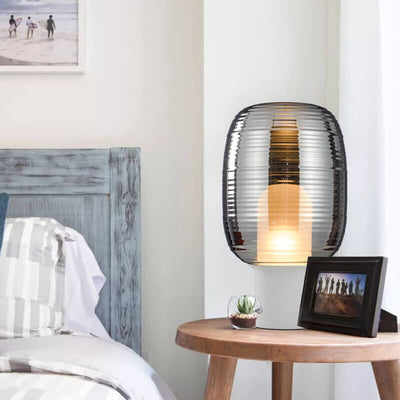 Lampe de table moderne minimaliste à rayures ovales en verre à 1 lumière 