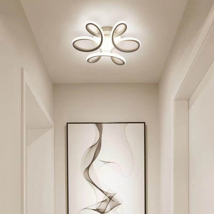 Luz de techo LED semi-empotrada con diseño de flor curva simple 
