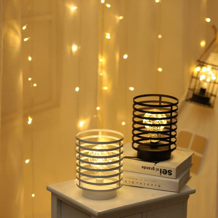 Moderne minimalistische runde LED-Tischleuchte aus Eisen mit Säulenform und Batteriebetrieb 