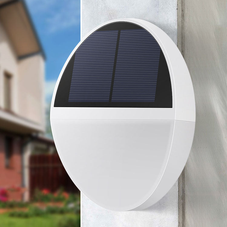 Moderne minimalistische Solar-LED-Außenwandleuchte mit Radarsensor, wasserdicht, aus ABS, rund, flacher Korpus, für den Garten 