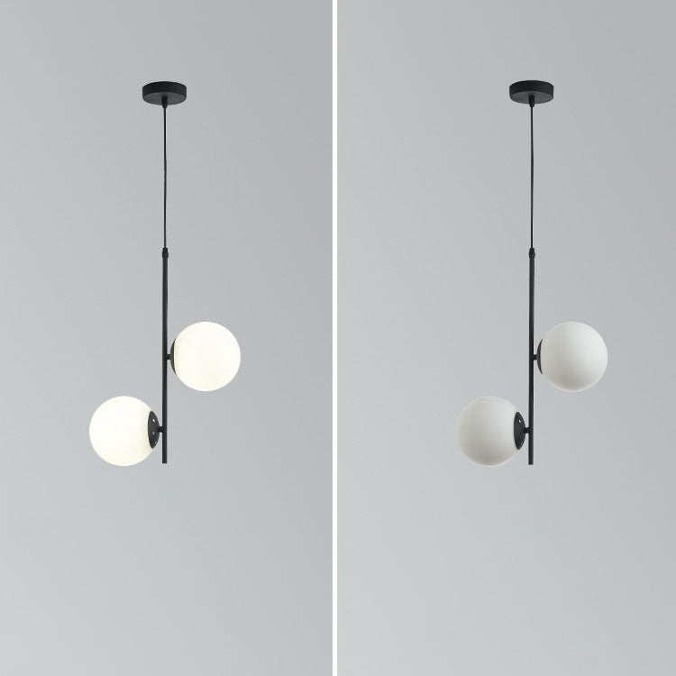 Moderner minimalistischer 2-flammiger Kronleuchter mit rundem Glaskugel- und Astdesign aus Eisen für das Wohnzimmer 