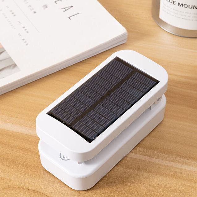 Lámpara de escritorio LED de protección ocular, plegable, solar simple y con atenuación infinita 