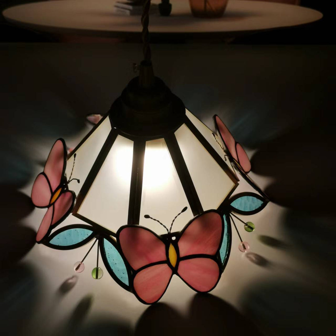 Moderne nordische 1-flammige Pendelleuchte aus Kupfer mit Schmetterlings-Buntglas in Kegelform für das Wohnzimmer 