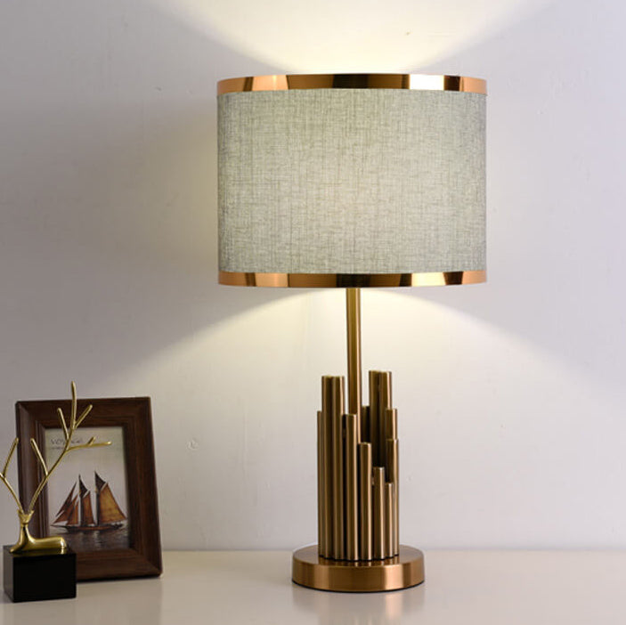 Lámpara de mesa de 1 luz con diseño cilíndrico simple de lujo ligero y moderno de tela 
