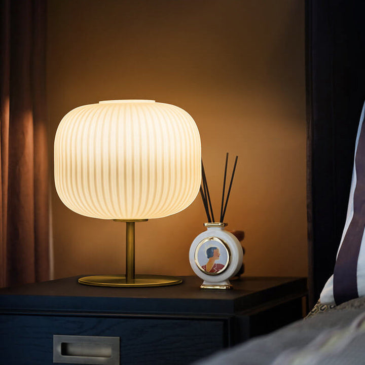 Lampe de table ovale à 1 lumière en verre à rayures blanches lait de luxe nordique 