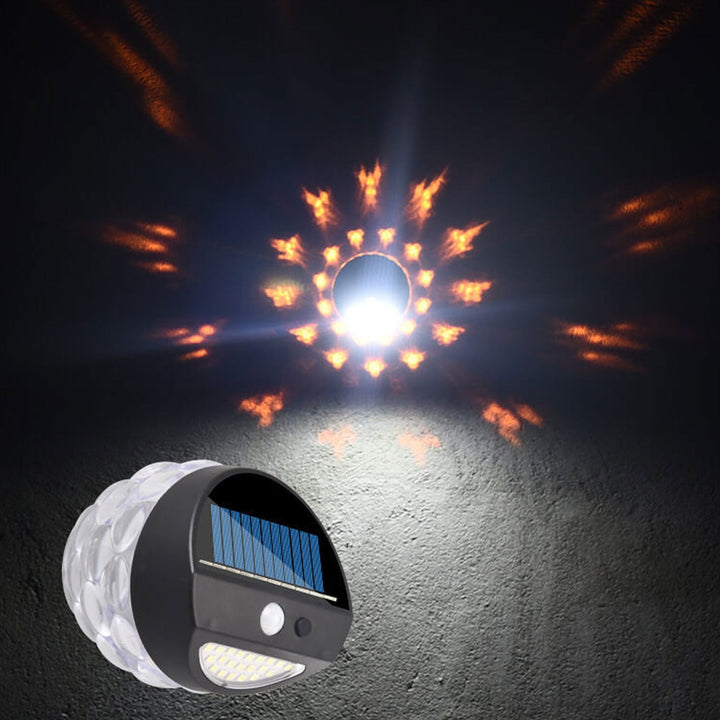 Solar Flamme Springen Projektion Ananas Outdoor Wasserdicht 28 LED Garten Wandleuchte 