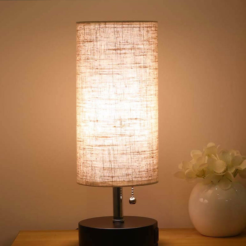 Lampe de table à 1 lumière en tissu de fer creux à colonne créative 