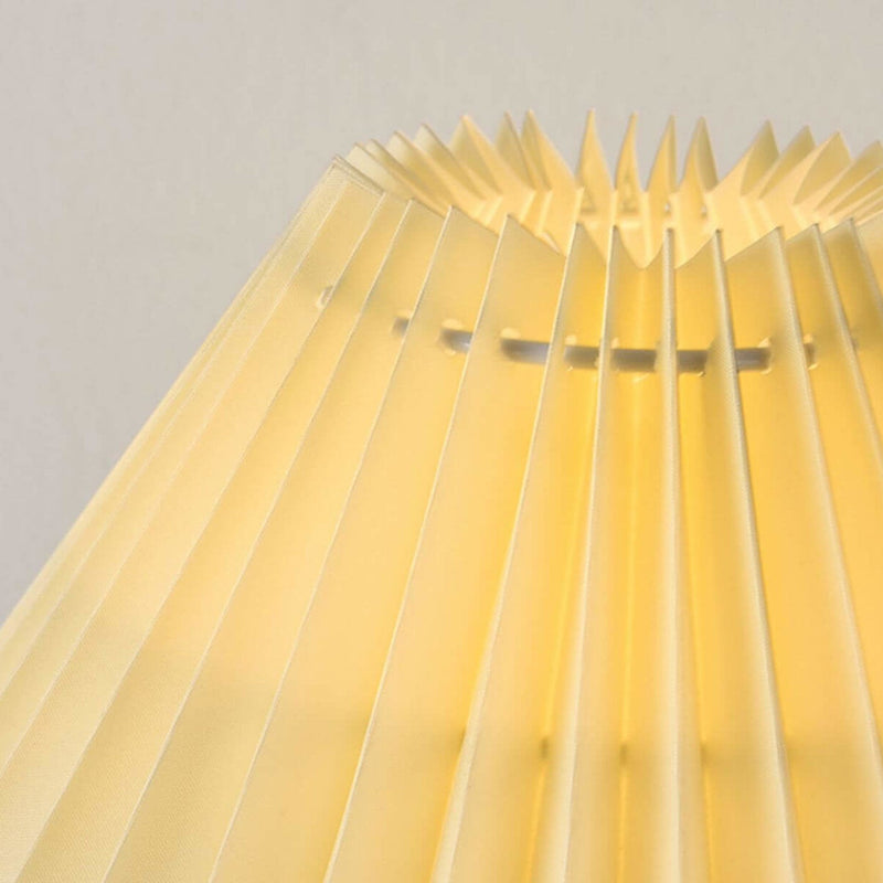 Lampe de table 1 lumière avec abat-jour plissé jaune lait nordique et base en céramique géométrique 
