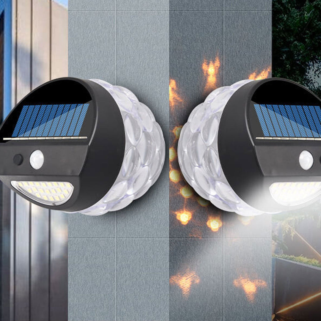 Solar Flamme Springen Projektion Ananas Outdoor Wasserdicht 28 LED Garten Wandleuchte 