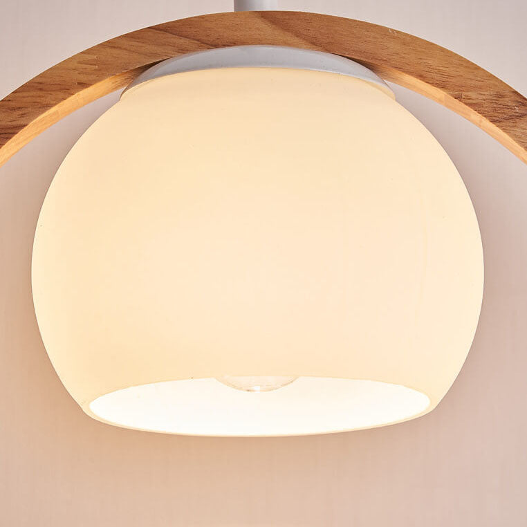 Moderne nordische Pendelleuchte mit Glas, Kautschukholz-Ring und Vogel-Design, 1-flammig, für das Wohnzimmer 