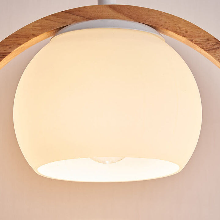 Moderne nordische Pendelleuchte mit Glas, Kautschukholz-Ring und Vogel-Design, 1-flammig, für das Wohnzimmer 