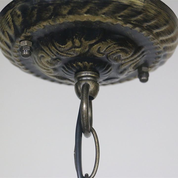 Traditionelle 3-flammige Tiffany-Pendelleuchte mit Eisenkuppel und Buntglas in Edelsteinoptik für das Wohnzimmer 