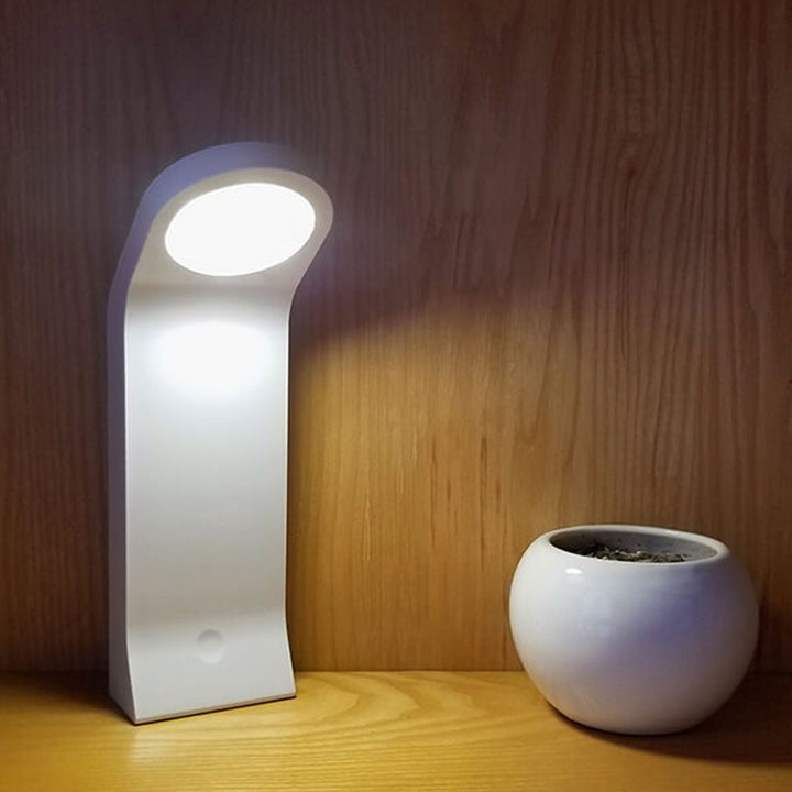 Lampe de bureau à induction USB avec forme incurvée créative 