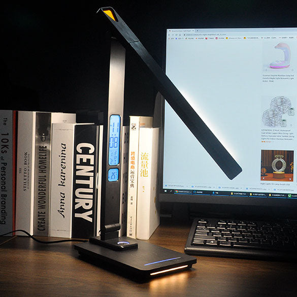 Lampe de bureau à chargement sans fil LED rotative multifonctionnelle simple 