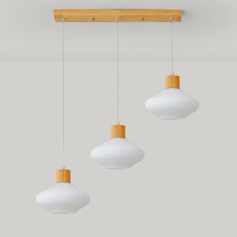 Moderne minimalistische ovale Inselleuchte aus Glas, Gummibaumholz und Metall, 1/3-flammiger Kronleuchter für das Esszimmer 