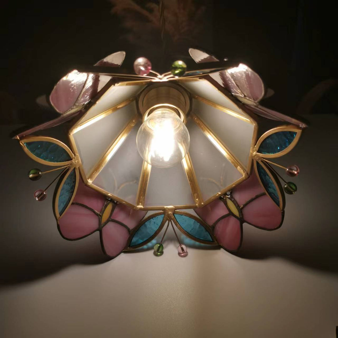 Moderne nordische 1-flammige Pendelleuchte aus Kupfer mit Schmetterlings-Buntglas in Kegelform für das Wohnzimmer 