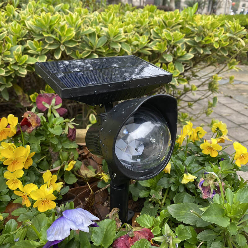 Solar drehbare Farbprojektions-LED Außen-Garten-Rasenleuchte 