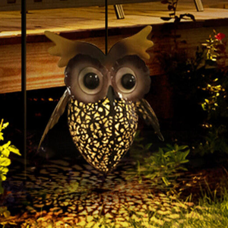 Lumière suspendue extérieure LED solaire étanche en fer forgé creux avec motif de hibou 
