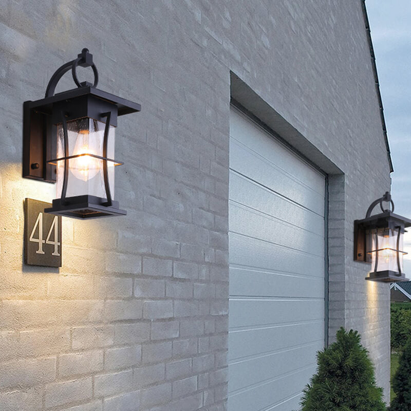 Aplique de pared impermeable moderno para exteriores con jaula de vidrio transparente y 1 luz 