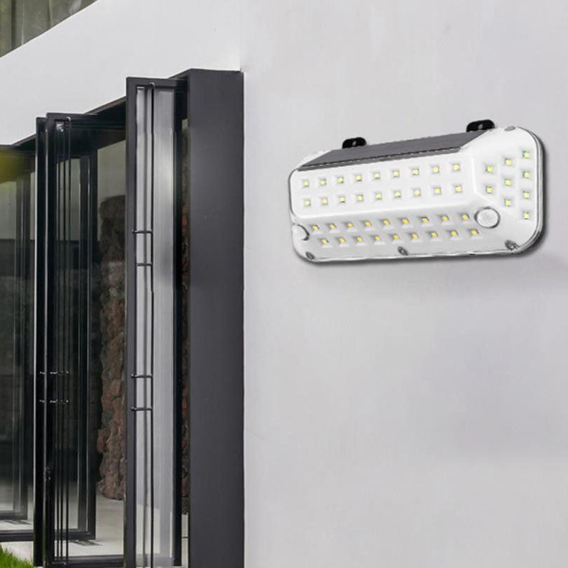 Applique murale extérieure LED avec capteur de corps émettant de la lumière latérale en ABS Simple solaire 