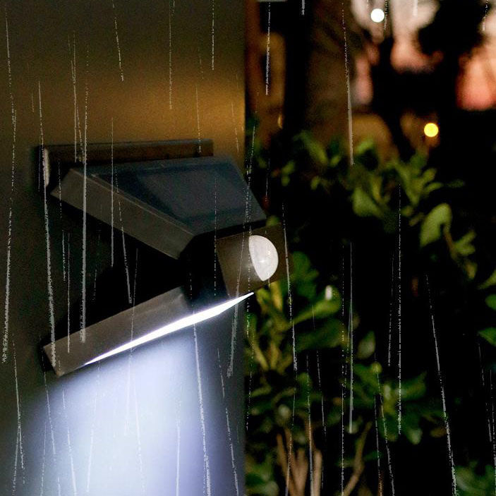 Aplique de pared para patio exterior LED solar impermeable con sensor de movimiento, cuerpo plegable en forma de mariposa de plástico ABS y PVC, estilo minimalista moderno 