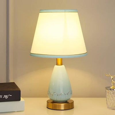 Lámpara de mesa de 1 luz con base de jarrón minimalista moderno redonda trapezoidal de cerámica, metal y tela para dormitorio 