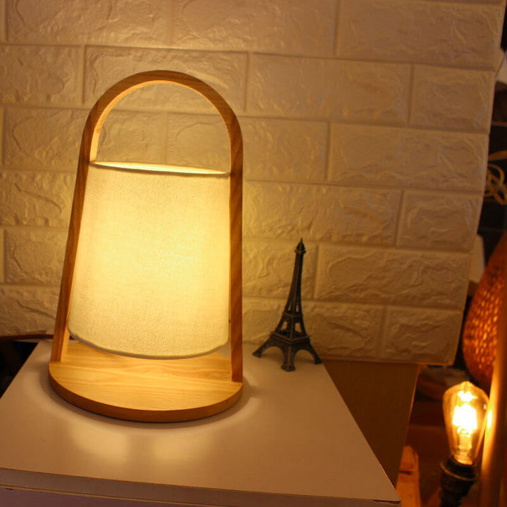 Lampe de table 1 lumière en bois massif créatif nordique avec abat-jour en tissu portable 
