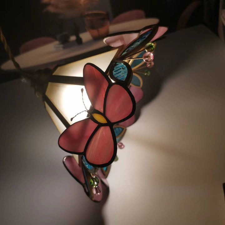 Moderne nordische 1-flammige Pendelleuchte aus Kupfer mit Schmetterlings-Buntglas in Kegelform für das Wohnzimmer 