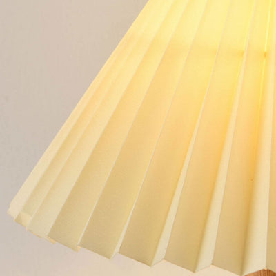 Lampe de table 1 lumière avec abat-jour plissé jaune lait nordique et base en céramique géométrique 