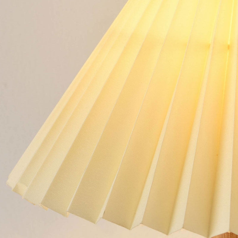 Lampe de table 1 lumière avec abat-jour plissé jaune lait nordique et base en céramique géométrique 