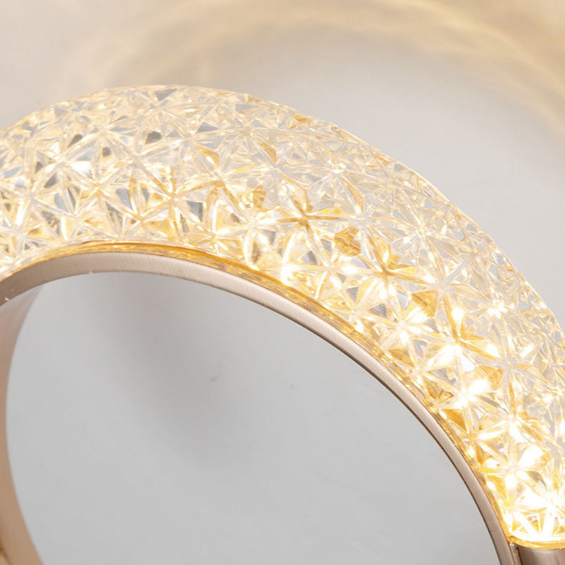 Lámpara de pared LED con pantalla de acrílico y anillo de hierro en oro rosa de lujo moderno para dormitorio 