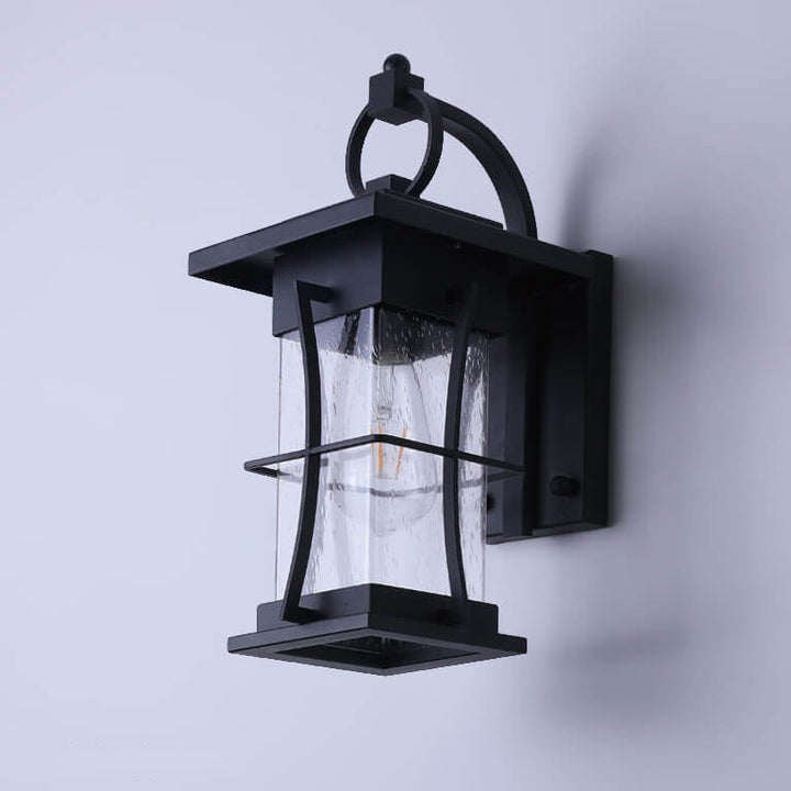 Aplique de pared impermeable moderno para exteriores con jaula de vidrio transparente y 1 luz 