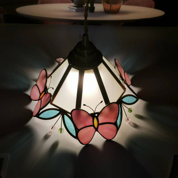 Moderne nordische 1-flammige Pendelleuchte aus Kupfer mit Schmetterlings-Buntglas in Kegelform für das Wohnzimmer 
