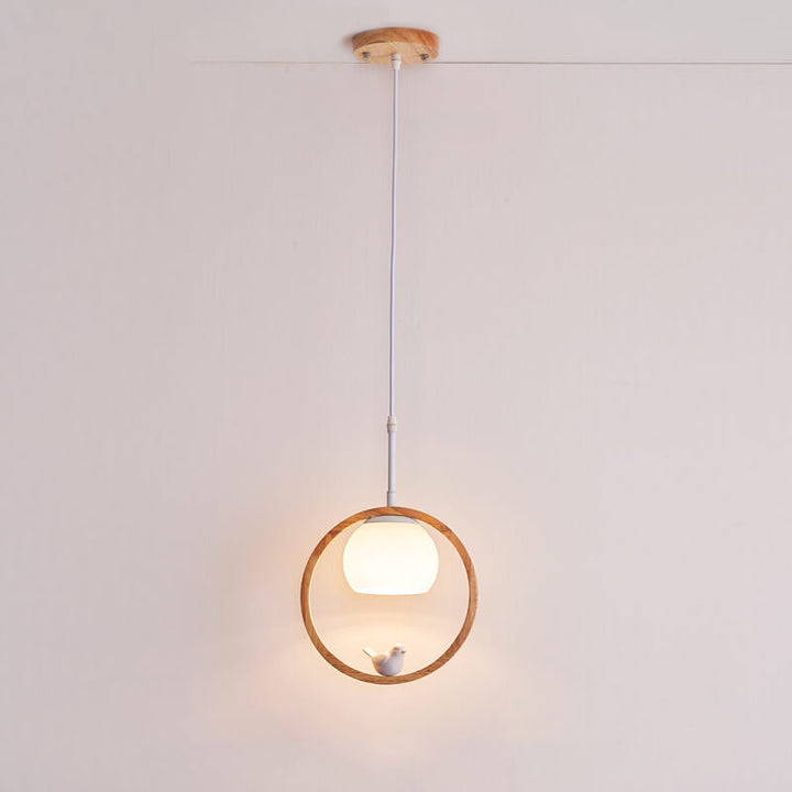 Moderne nordische Pendelleuchte mit Glas, Kautschukholz-Ring und Vogel-Design, 1-flammig, für das Wohnzimmer 