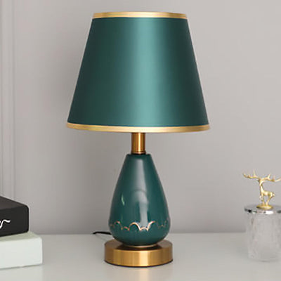 Lámpara de mesa de 1 luz con base de jarrón minimalista moderno redonda trapezoidal de cerámica, metal y tela para dormitorio 
