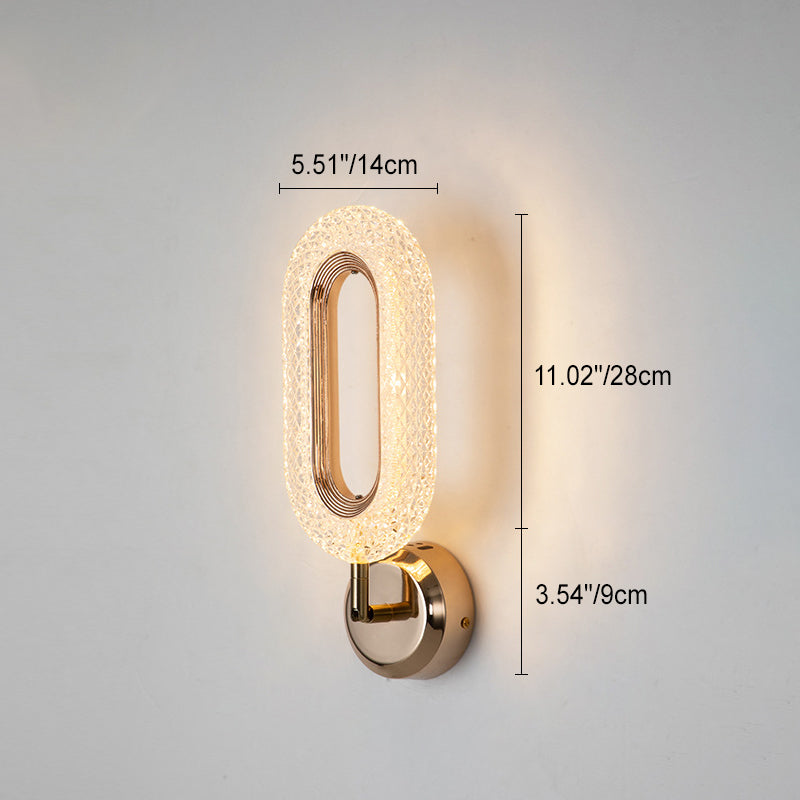 Lámpara de pared LED con pantalla de acrílico y anillo de hierro en oro rosa de lujo moderno para dormitorio 