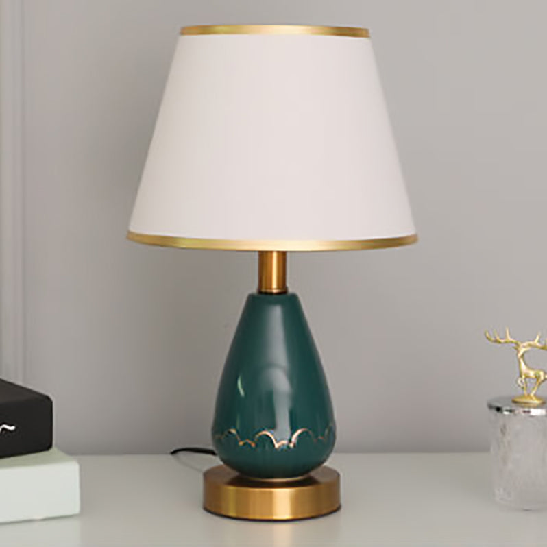 Lámpara de mesa de 1 luz con base de jarrón minimalista moderno redonda trapezoidal de cerámica, metal y tela para dormitorio 